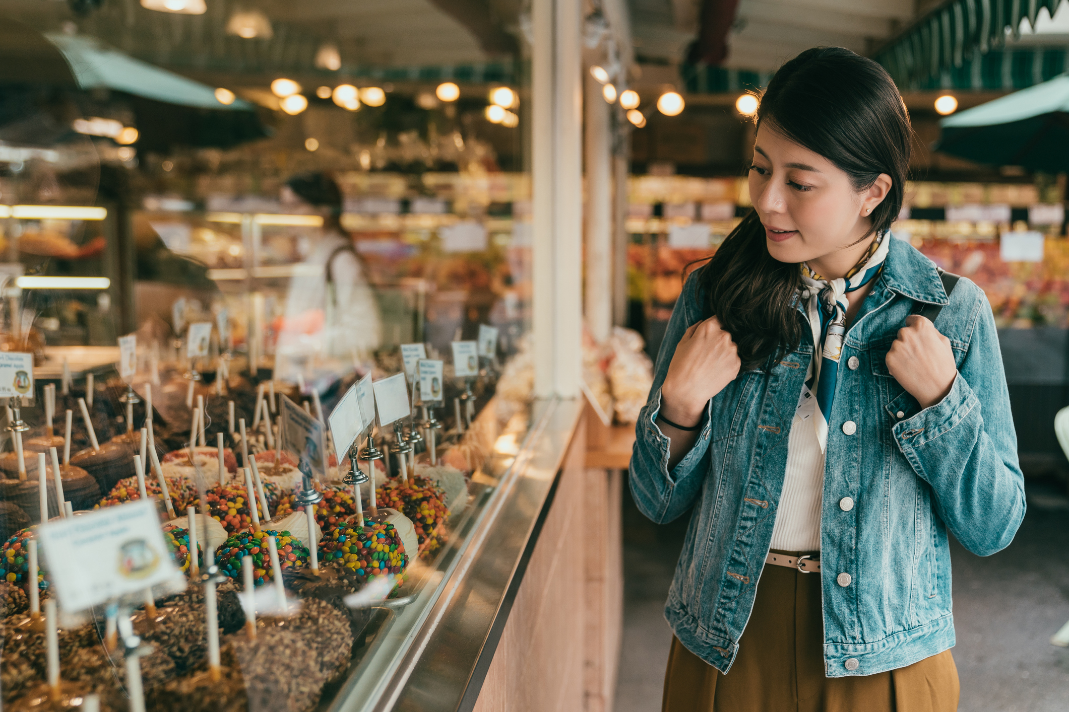 Woman looking at shop window