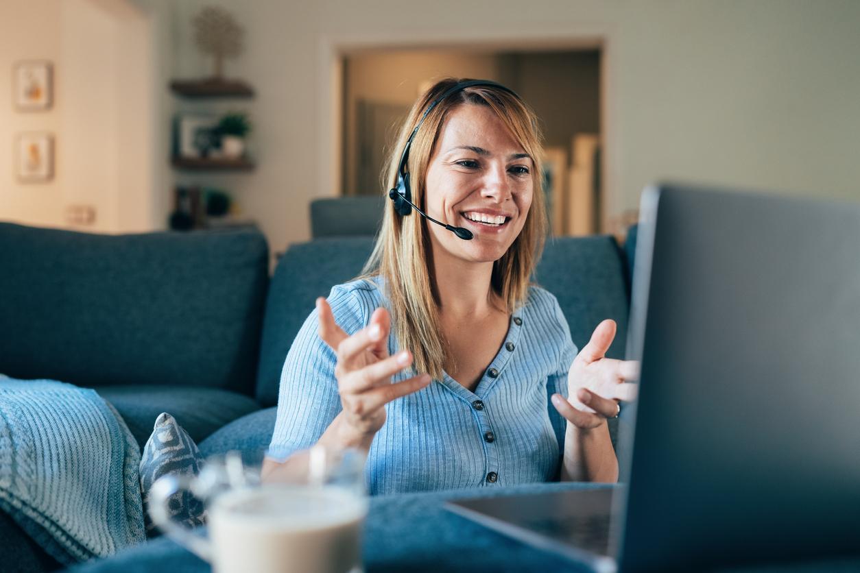 Woman working on her laptop at home