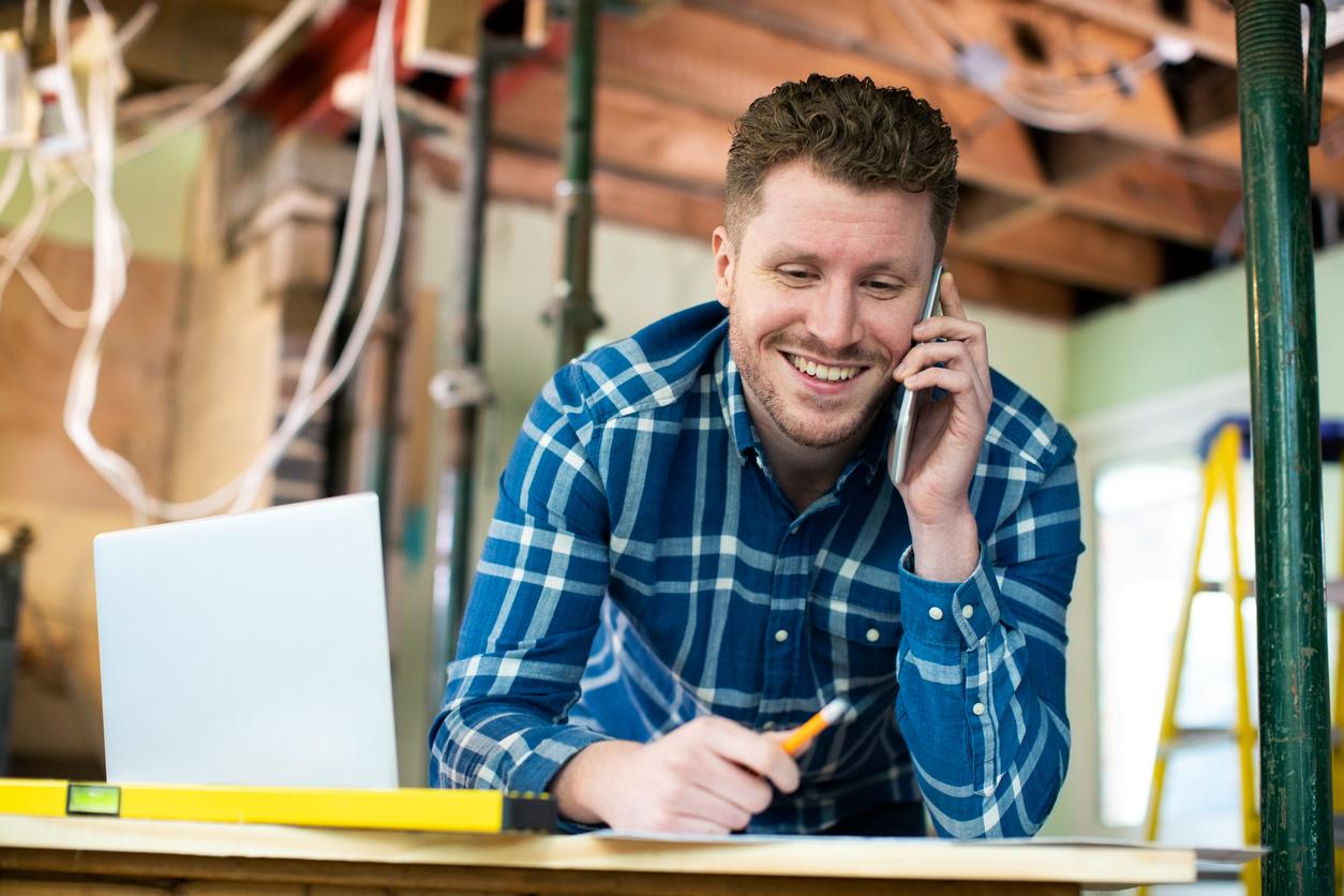 Workman talking on phone