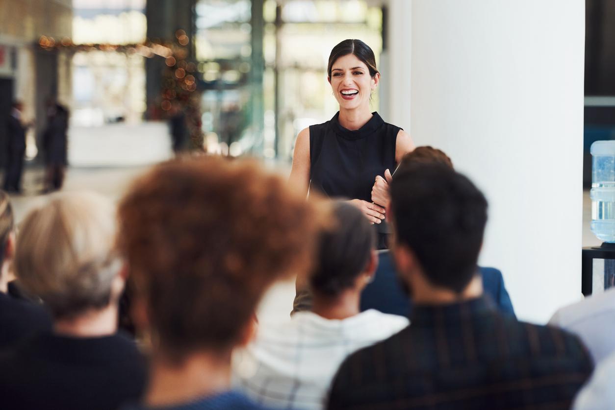 Woman presents to group