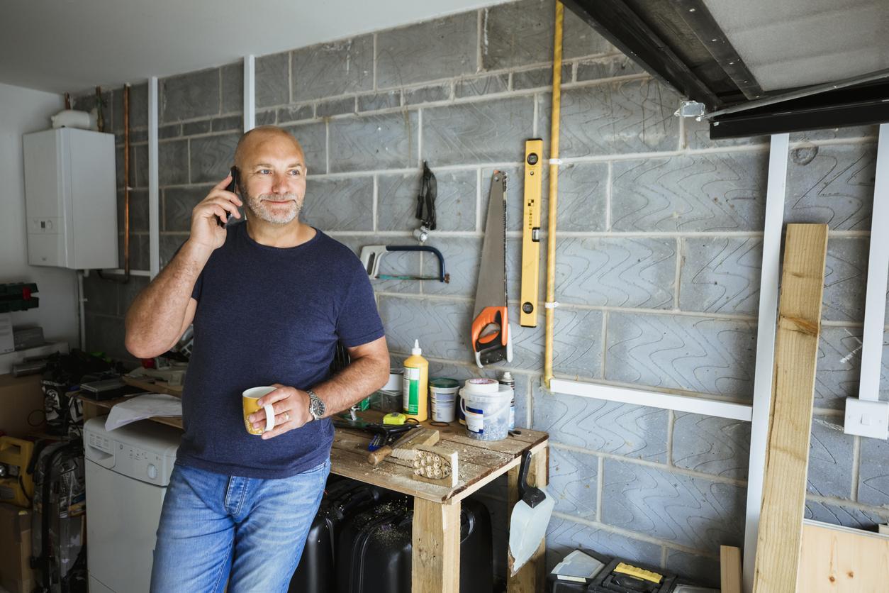 Man in garage with tools