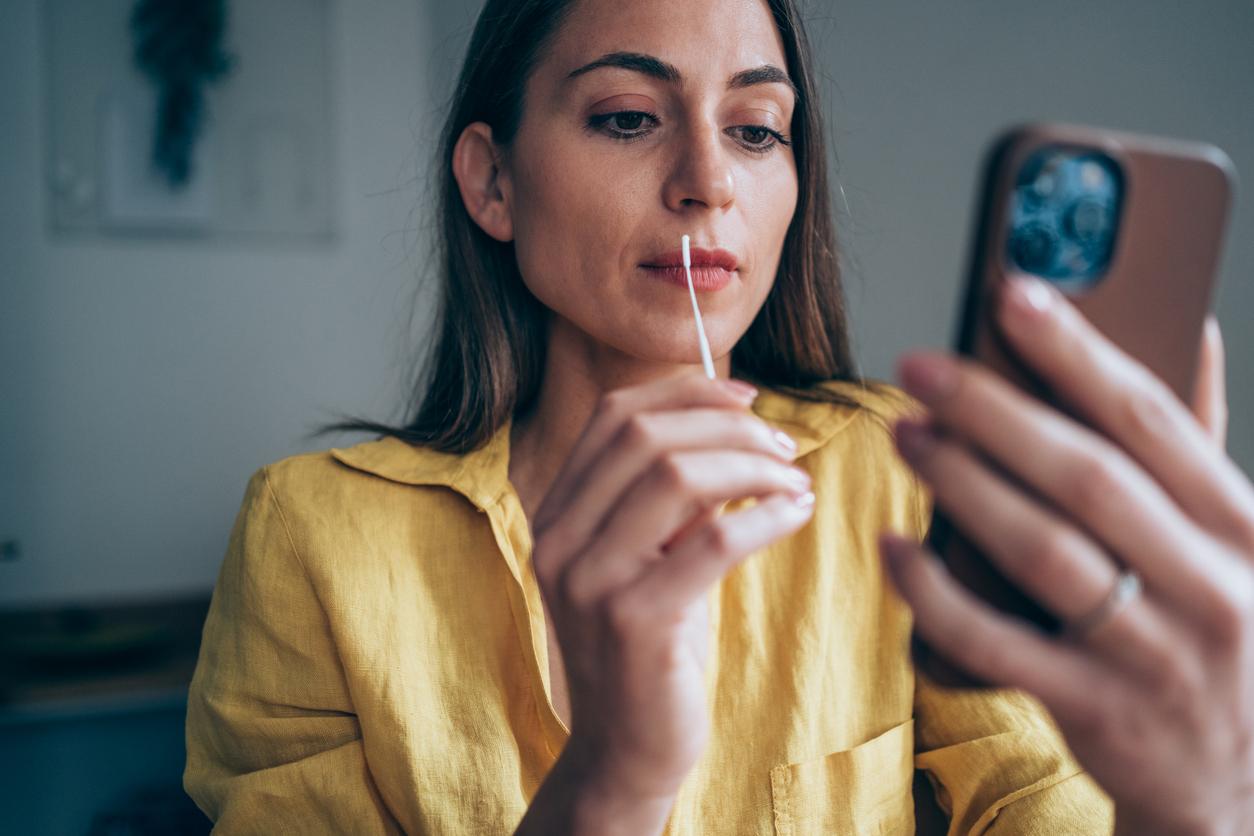 Woman taking covid test