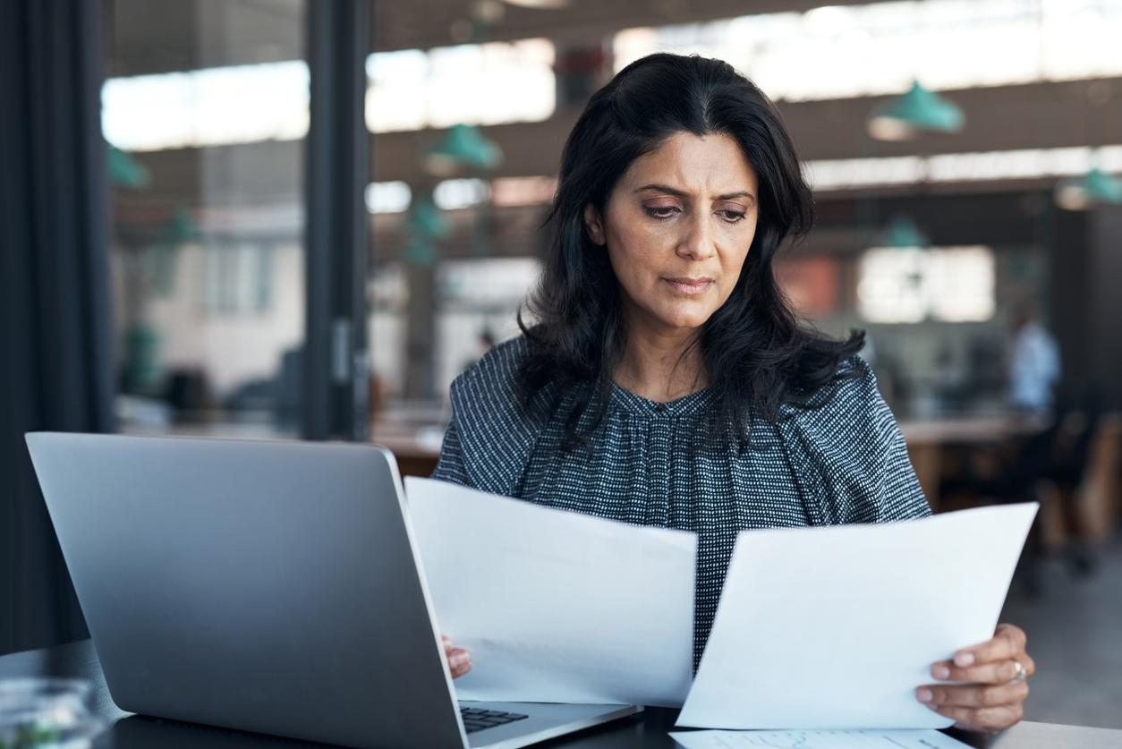 Woman looking at documents