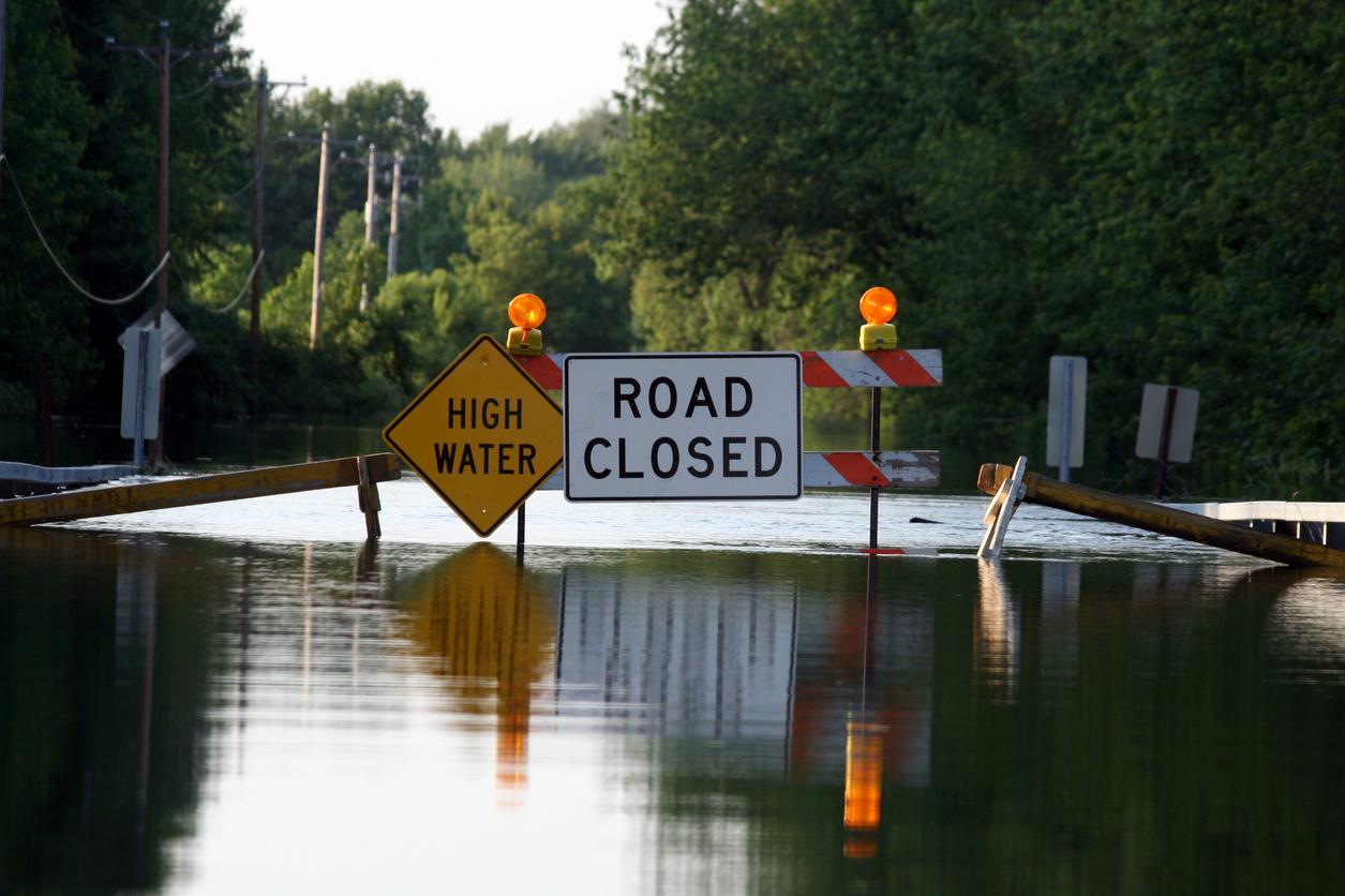 Road closed signs and high water