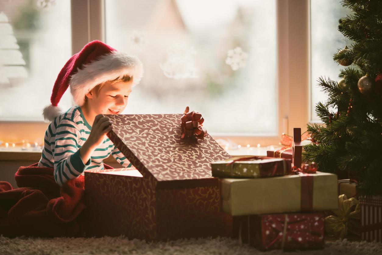 Boy opening Christmas present