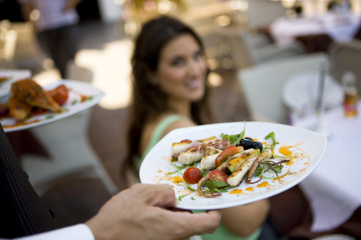 Woman being  served