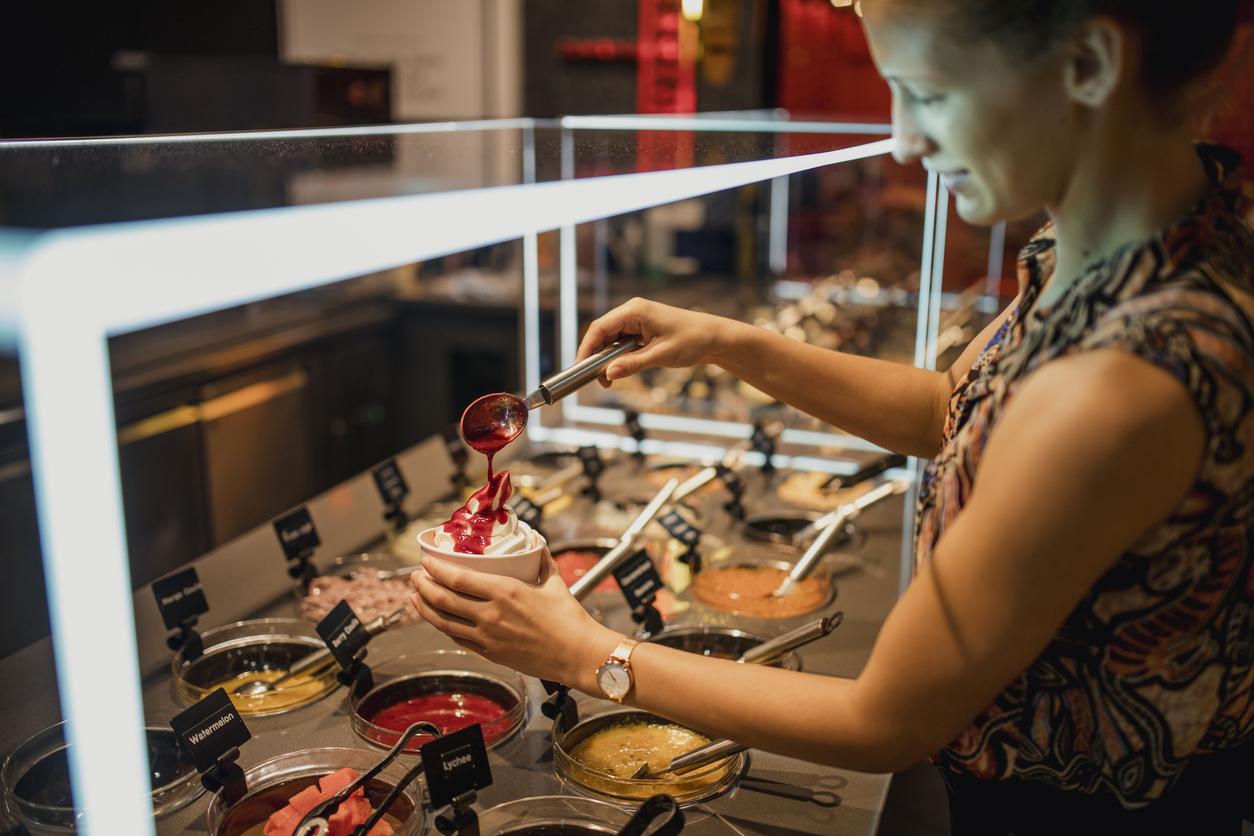 Woman serving ice cream