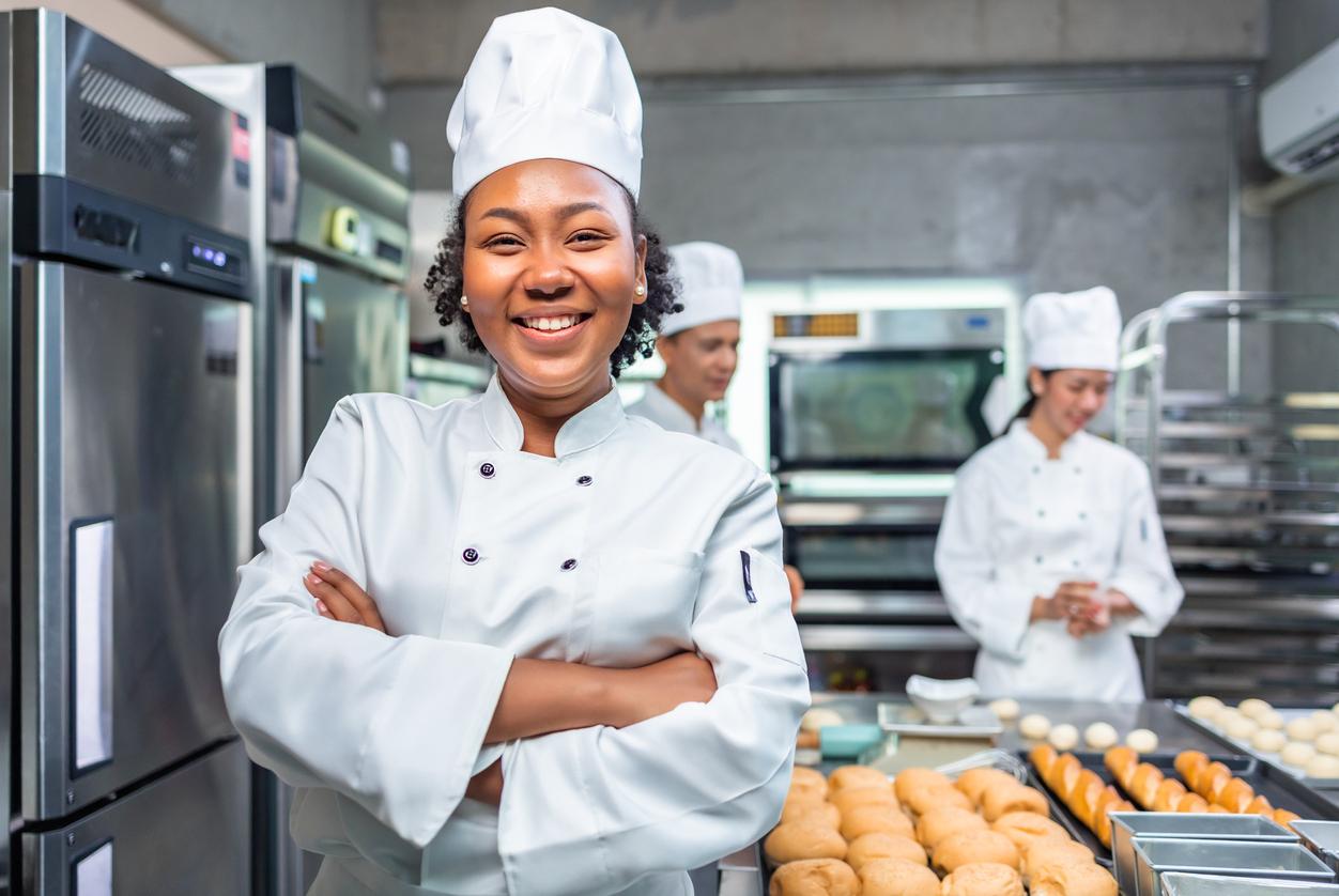 African American woman bakers looking at camera