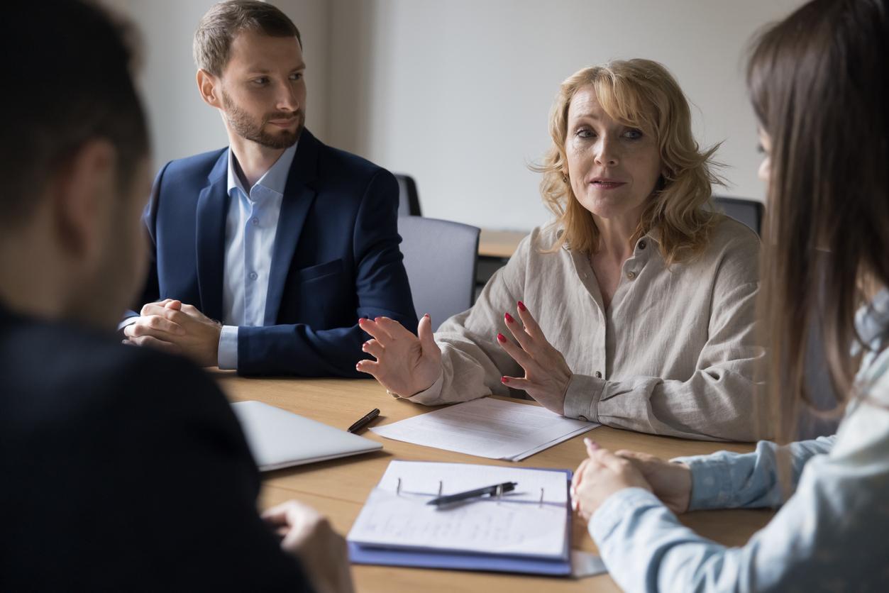 People chatting in meeting