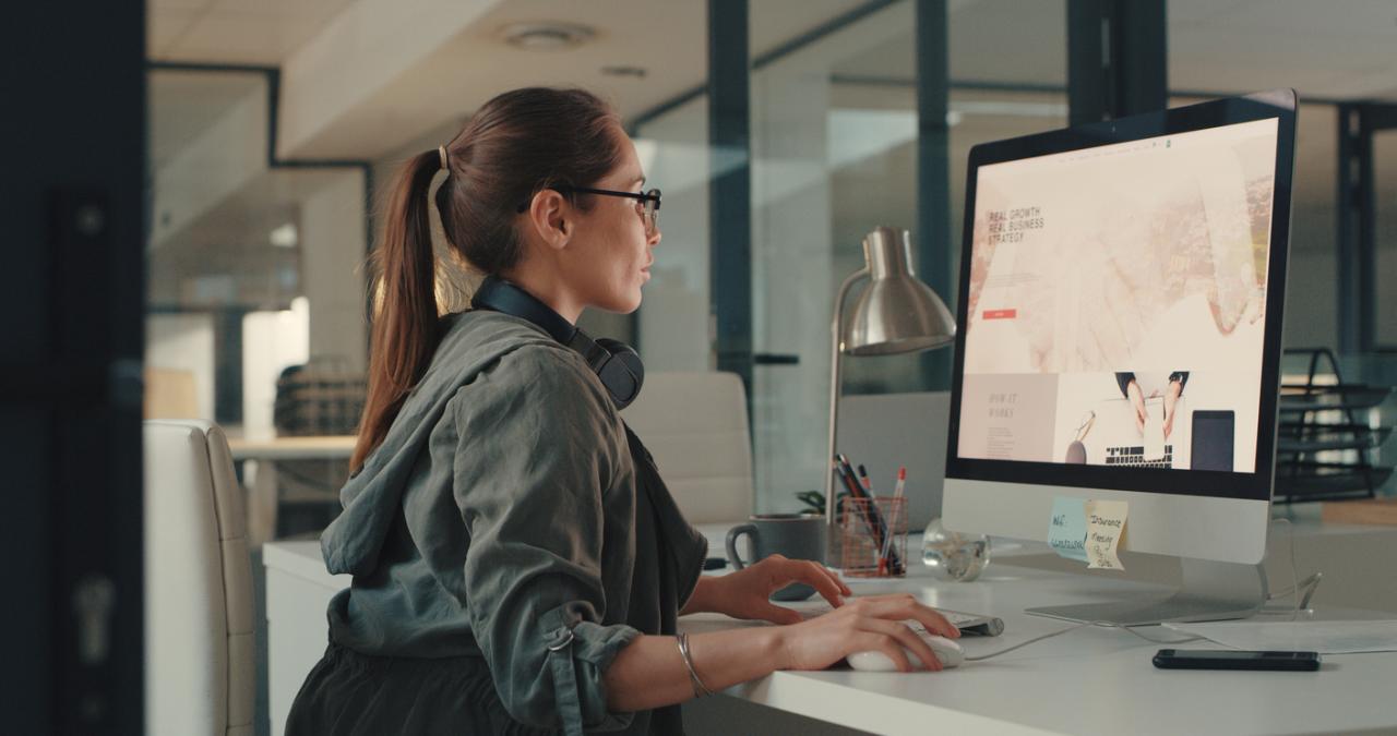 Woman looking at desktop