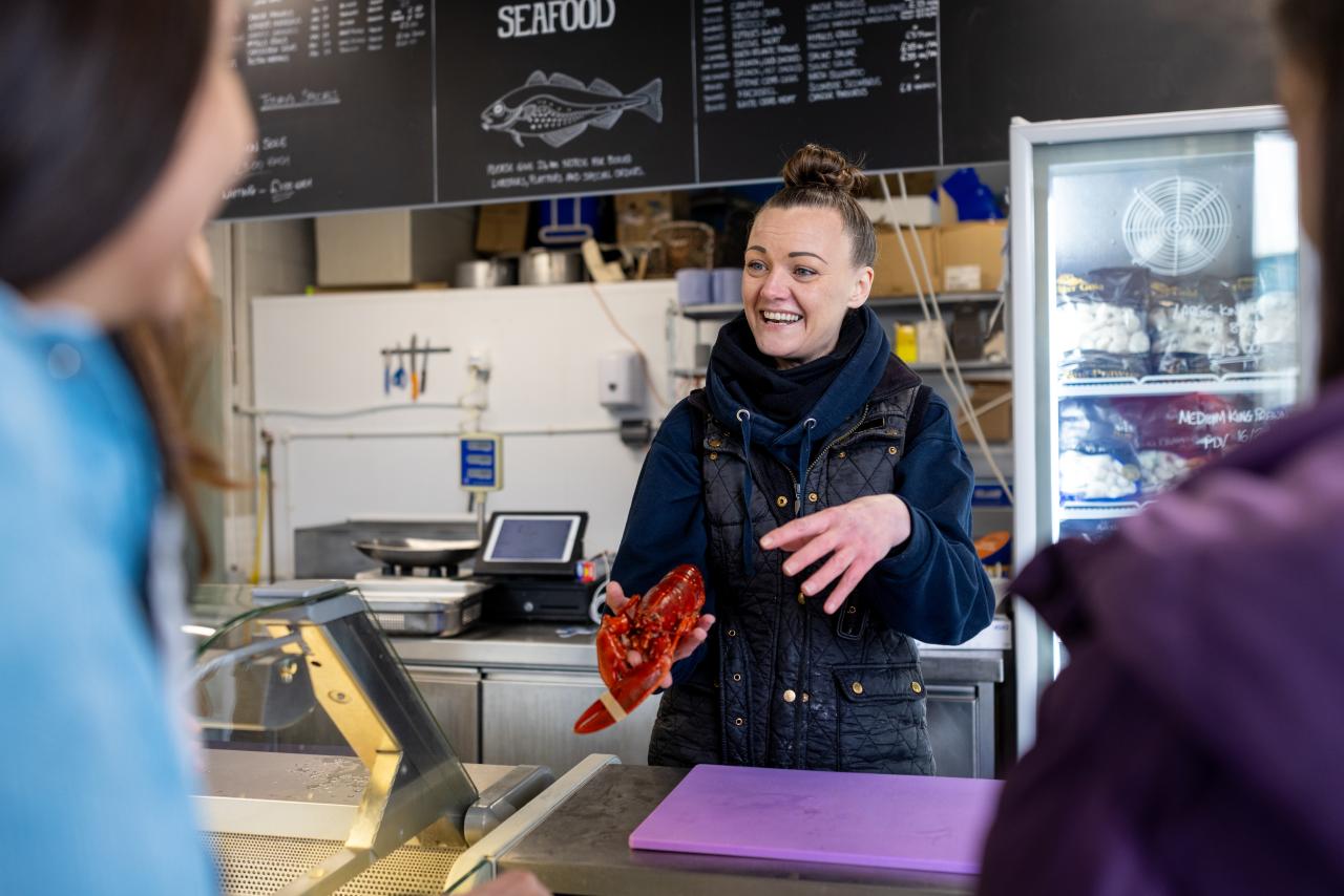 Woman selling seafood